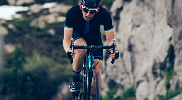 Road cyclist training in hilly area