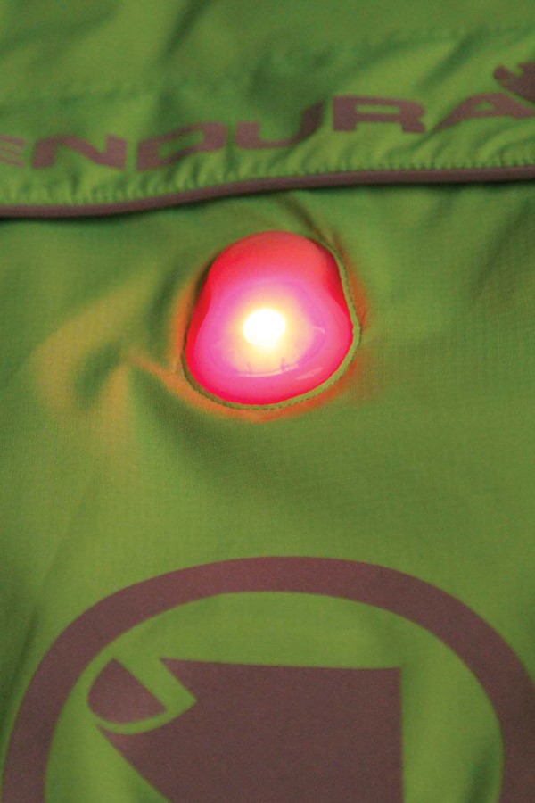 Luminite jacket with integrated rear light