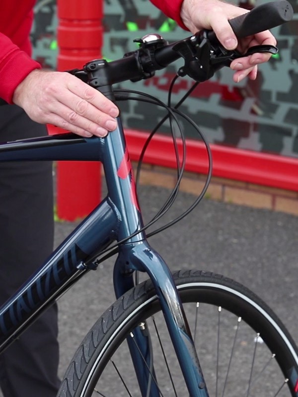 Phil showing how to check the handlebars using the M check method