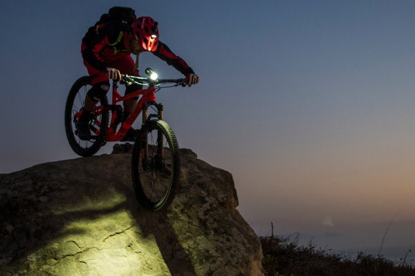 mountain biker riding at night