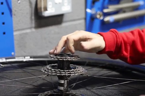 Place cogs onto freehub