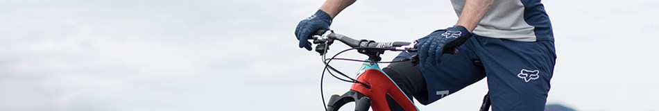 Close up of a MTB'er wearing Fox Gloves