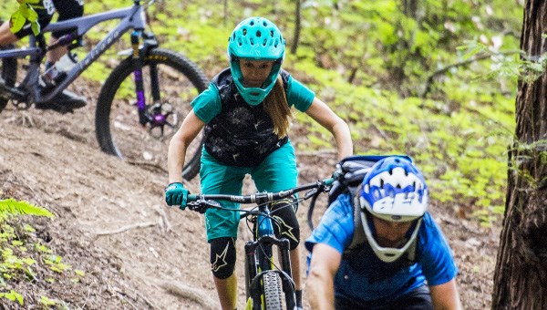 Enduro riders wearing helmets with removable chin guards