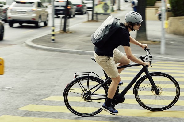 Commuter cycling through the city