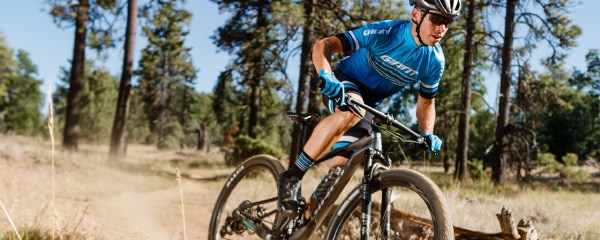 mountain biker on dusty trail