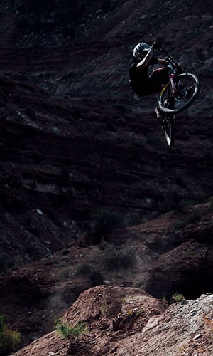 A mountain biker wearing ION Seek clothing