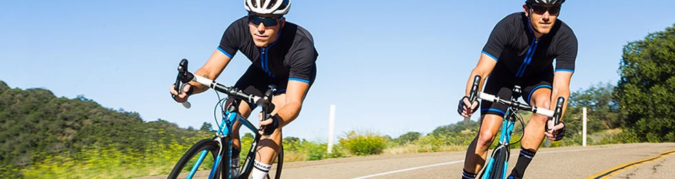 Road cyclists riding in tanedem