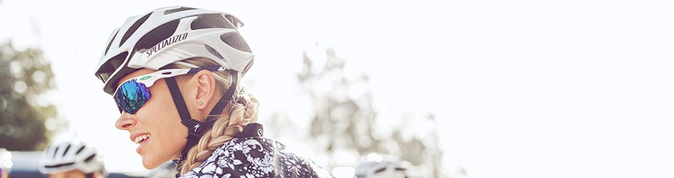 Road cyclist wearing helmet