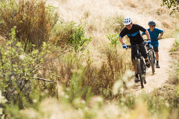 Junior cyclists on trail