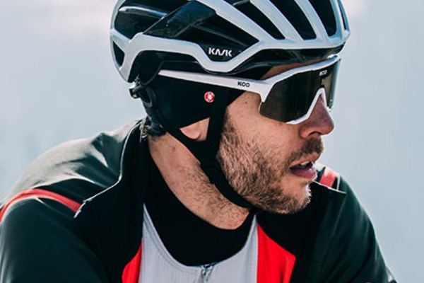 cyclist wearing glasses and a headband