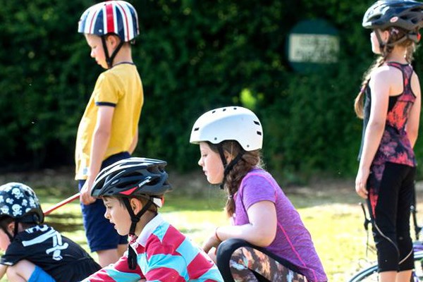 Kids wearing bike helmets