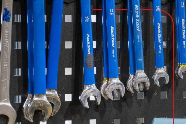 A mountain biker riding a hardtail down a trail