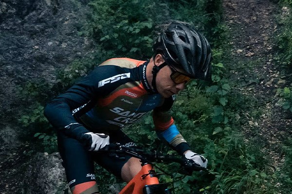 XC rider wearing an MTB helmet