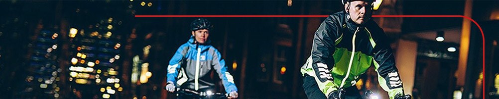 City cyclists wearing high visibility jackets