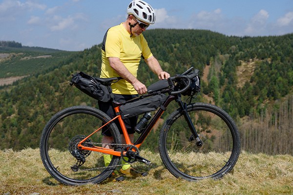 Shirts & T-Shirts Guide Gravel rider in the mountains