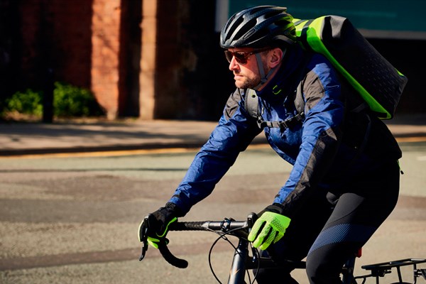 A commuter dressed for winter cycling