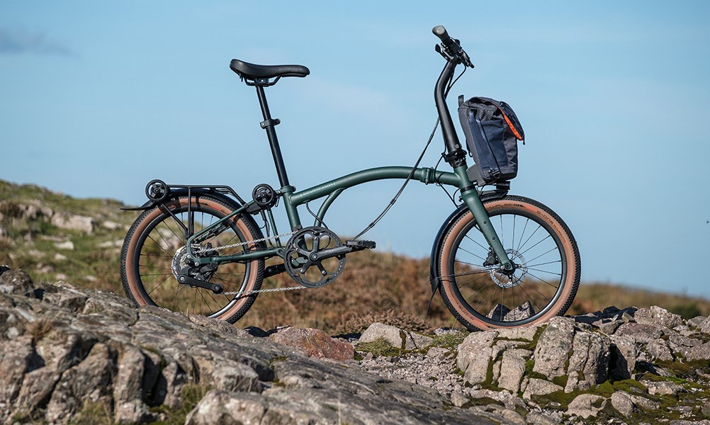 Brompton Electric G Line bike on rocks