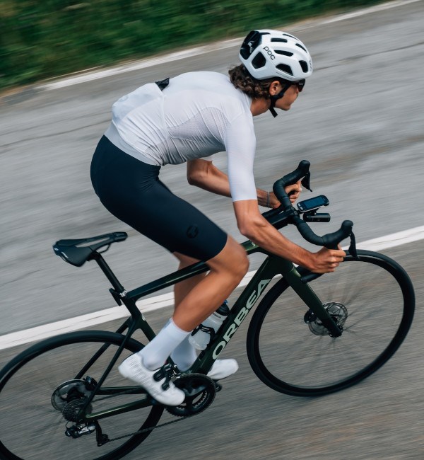 road cyclist riding orbea orca