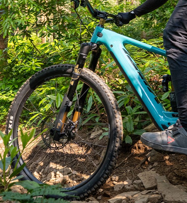 Fox Podium Fork on a Yeti ebike being ridden down a rough trail