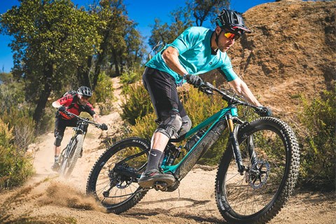 Mountain bikers on dusty trail