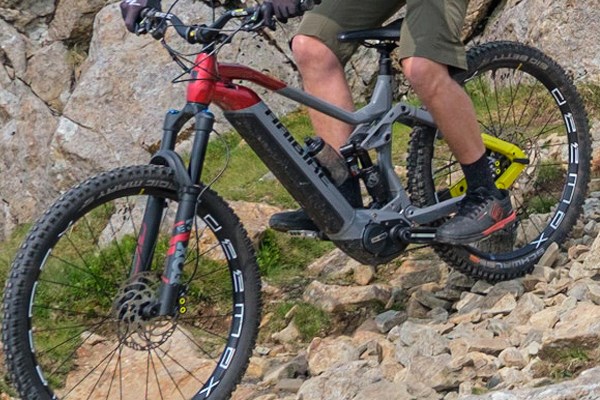 Riding a Haibike NDuro down a steep rocky descent