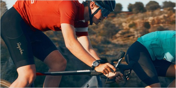 A cyclist riding over rough terrain on the Topstone Carbon 2020