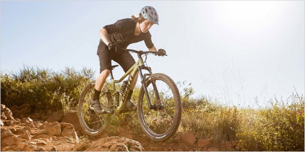 The 2020 Stance 1 29er being ridden over rough terrain