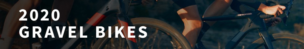 Two cyclists riding along a rough road on a couple of 2020 Cannndale gravel bikes